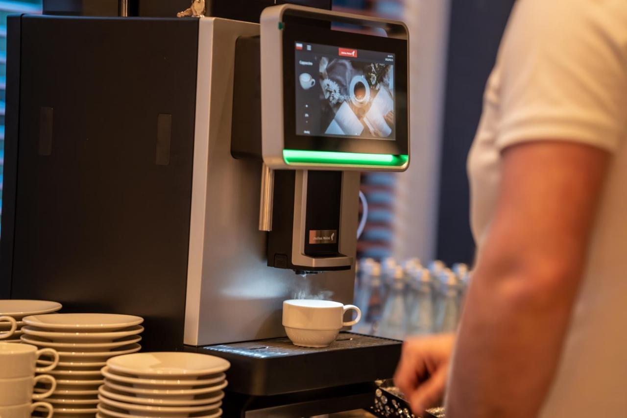 Belmonte Hotel Krynica-Zdroj Bagian luar foto A coffee machine